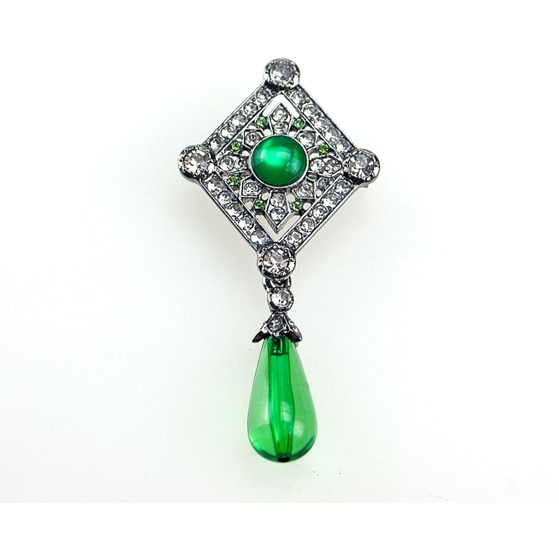 1920's Silver Rhinestone Brooch with Green Gemstones